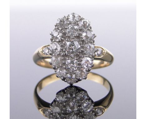 An 18ct diamond panel ring circa 1900,the main panel set with approx. 1.5cts of old-cut diamonds, panel height 18mm, size R.