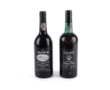 A bottle of Croft 1970 vintage port, bottled in 1972; together with a bottle of Dow’s 1979 vintage port, bottled in 1981. (2)