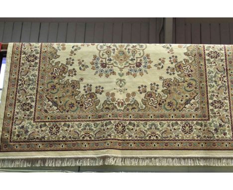 Keshan carpet with a beige ground 280cm x 200cm