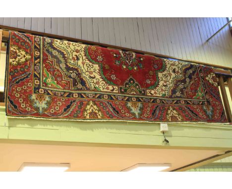 Persian design carpet with a red ground 363cm x 274cm