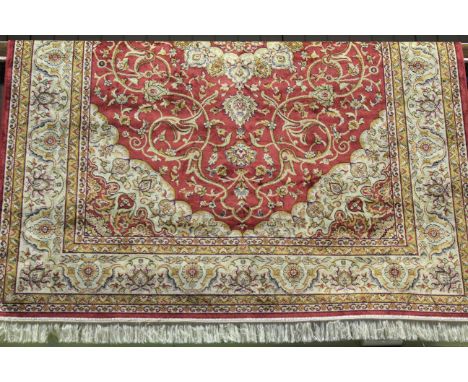 Keshan carpet with a red ground 230cm x 160cm