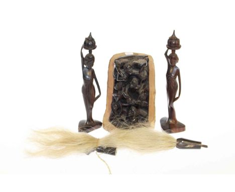 Collection of carved African pieces including pair of figures