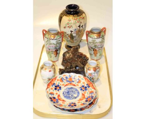 Two pair of Oriental vases, single vase, pair of Imari plates and soapstone carvings