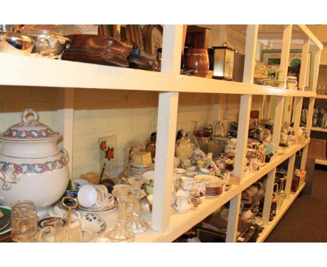 Full shelf of glass and china including Masons, teaware, clocks, slop pail, books, etc