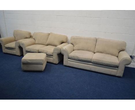 A BEIGE UPHOLSTERED FOUR PIECE LOUNGE SUITE, comprising two sized two seater settees, width 195cm and 160cm, an armchair and 