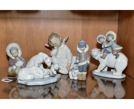 FIVE LLADRO FIGURES, 'Eskimo Playing' No.1195, 'Bearly Love' No.1443, 'Eskimo Boy with Pet' No.5238, all three designed by Ju