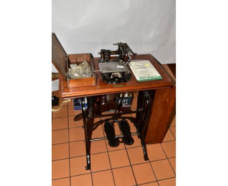 A MID VICTORIAN JOSEPH HARRIS OF BIRMINGHAM 'THE IMPERIAL' TREADLE SEWING MACHINE, serial no 4927, gilt transfer decoration, 