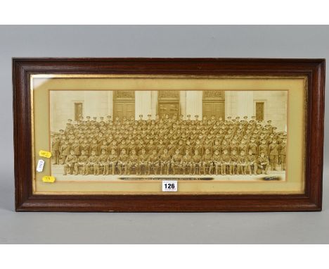 A LARGE GLAZED PERIOD FRAME, approximately 64cm x 32cm, containing a mounted sepia photograph, in landscape mode of the 'Head
