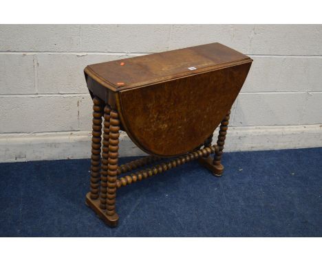 A VICTORIAN BURR WALNUT OVAL TOPPED SUTHERLAND TABLE, on bobbin turned legs and stretchers, open length 105cm x closed length