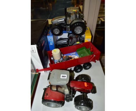 A QUANTITY OF BOXED AND UNBOXED BRITAINS ERTL AND BRUDER TRACTORS AND FARM MACHINERY, all 1/16 scale, boxed Bruder Deutz Agro