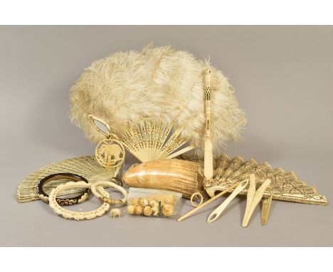 A BOX OF LATE 19TH AND EARLY 20TH CENTURY BONE, IVORY AND CELLULOID, including a bone Stanhope letter opener, the blade engra