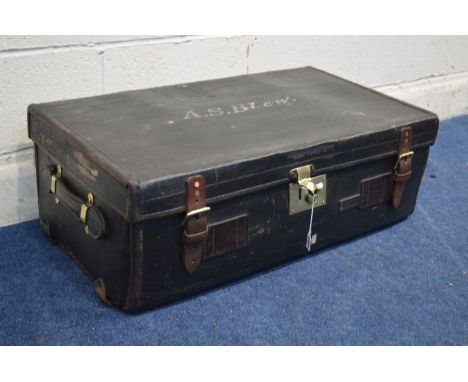 A VINTAGE BLACK GROUND AND LEATHER TRAVELLING TRUNK, with travel labels, width 83cm x depth 46cm x height 32cm together with 