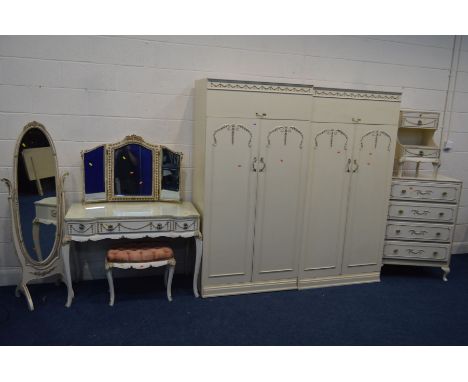 A CREAM AND GILT BEDROOM SUITE, comprising two double door wardrobes, width 92cm x depth 54cm x height 187cm, a dressing tabl