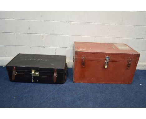A VINTAGE BLACK CANVAS TRAVELLING TRUNK, with brown leather straps and brass studs, marked R Clamp &amp; Son, with an interna