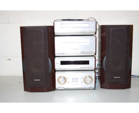 A TECHNICS HD550 MINI COMPONENT HI-FI, including amplifier, tuner, CD, tape deck, remote and a pair of matching speakers (PAT