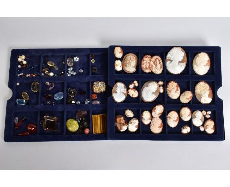 A TRAY OF PANELS AND LOOSE GEMSTONES, to include a tray of thirty four oval cameos, most depicting women in profile, three gr