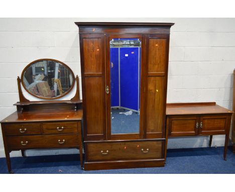 AN EDWARDIAN MAHOGANY AND STRUNG THREE PIECE BEDROOM SUITE, Harrods London label to wardrobe, comprising a single mirror door