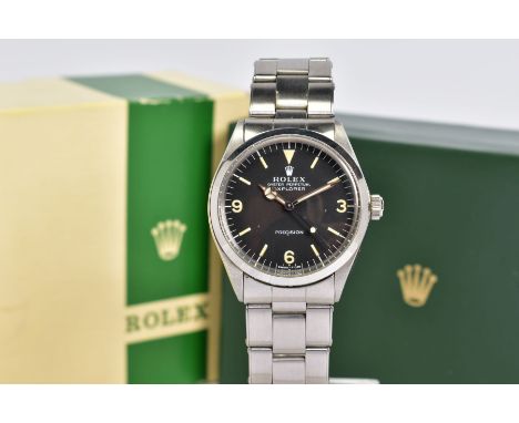 A 1971 ROLEX EXPLORER AUTOMATIC PRECISION WRISTWATCH, black dial with faded baton and Arabic numeral markers, Mercedes hands,