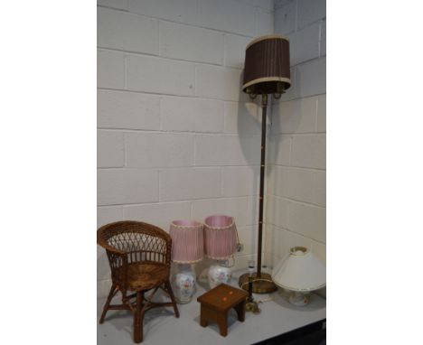 A WICKER DOLL ARMCHAIR, together with an oak milking stool, a pair of ceramic table lamps with shades, two other table lamps,