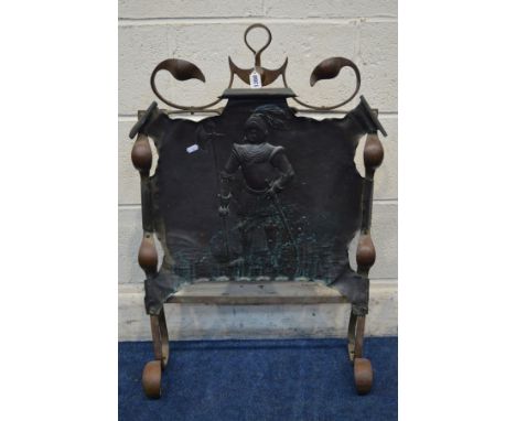 AN EARLY 20TH CENTURY ART NOUVEAU COPPERED FIRE SCREEN with a knight moulded to the panel, width 56cm x height 83cm