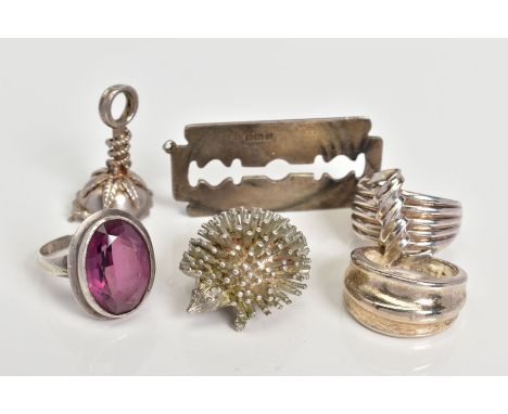 A SELECTION OF ITEMS, to include a silver pendant in the form of a blade, with a silver hallmark for Birmingham, two white me