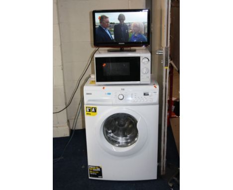 A ZANUSSI LINDO 100 WASHING MACHINE, a Philips 19FL3405H 19'' FSTV with remote and manual and a Tesco Microwave (all PAT pass