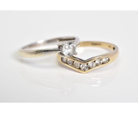 TWO 9CT GOLD CUBIC ZIRCONIA SET RINGS, the first a 9ct white gold ring set with a single circular cut cubic zirconia, with a 