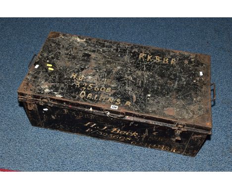A LARGE TIN TRUNK, approximately 88cm x 29cm x 46cm, black in colour with the following painted on P/325608 H.J. BACK, also p