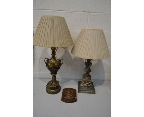 A BRASSED AND EBONISED GREEK STYLE TABLE LAMP with a shade, height to fitting 70cm, together with a brassed foliate table lam