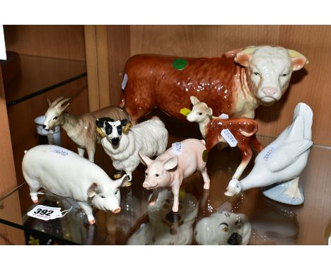 A GROUP OF CERAMIC FARM ANIMALS, to include Beswick Boar Ch 'Wall Champions 53rd' No1453A, 'Black Faced Ram' No3071, a Herefo