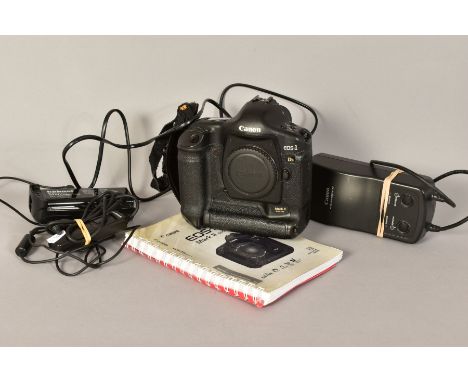 A CANON EOS 1DS MKII DIGITAL FULL FRAME SLR CAMERA, with two batteries, one Hafnell, one Canon, charger, body cap, Spider hol