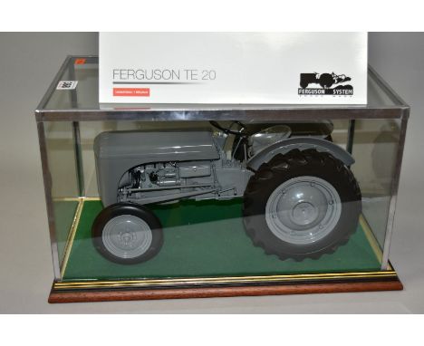 A BOXED UNIVERSAL HOBBIES 1/8 SCALE FERGUSON TE20 TRACTOR MODEL, limited edition complete with Certificate of Authenticity, N