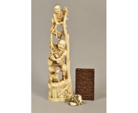 A LATE 19TH CENTURY JAPANESE IVORY OKIMONO, carved as a child standing at the top of some branches whilst a man collects frui