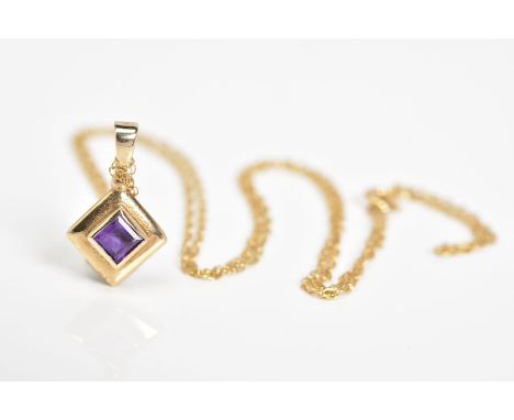 A 9CT GOLD AMETHYST PENDANT NECKLACE, the square cut amethyst set within a plain polished square mount, with a 9ct hallmark f
