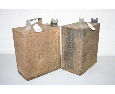 TWO VINTAGE FUEL CANS, comprising of one stamped Esso with a brass cap embossed Redline, the other stamped BP and the same on