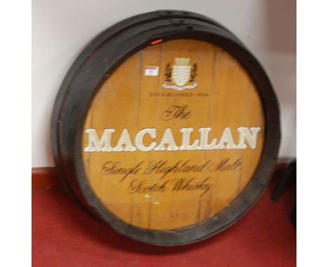 A coopered oak barrel top advertising the Maccallan Single Highland Malt Scotch Whisky, dia. 57cm