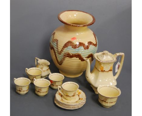 A 1930s five place setting tea service, on a cream ground with hand-painted floral decoration; together with a mid-20th centu