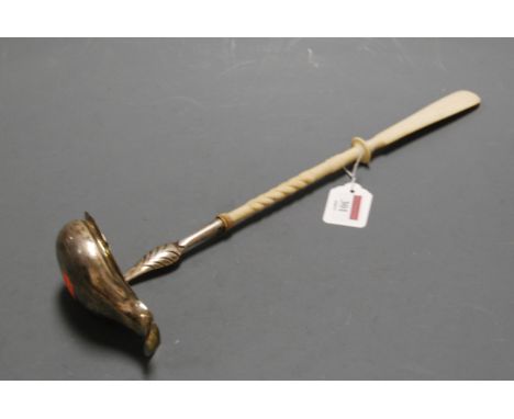 A 19th century white metal ladle, having shaped bowl and spirally turned ivory handle, stamped Fischer to the stem, length 39