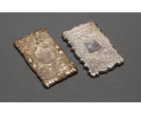 An Edwardian silver visiting card case, of hinged rectangular form, having all-over floral engraved decoration, maker William