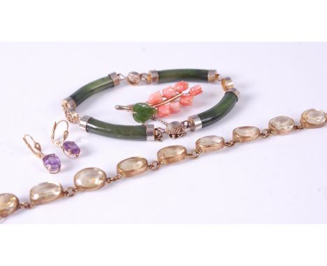 A citrine bracelet (converted), a pair of amethyst earrings, a Chinese silver gilt nephrite, and a carved coral and green har