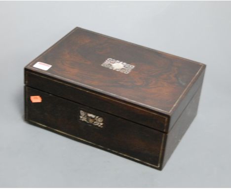 A Victorian rosewood and mother of pearl inlaid work box, having a blue silk-lined fitted interior, w.33cm