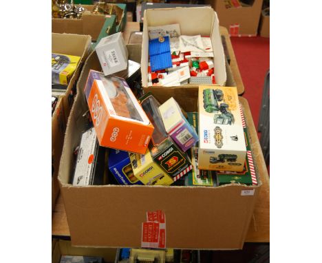 A large collection of boxed and loose diecast toy vehicles, to include Corgi TNT M.A.N. box trailer, Eddie Stobart Volvo shor