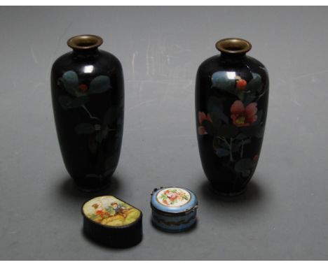 A pair of Japanese cloisonne vases with typical floral decoration together with a 19th century enamelled pill box, lacquered 
