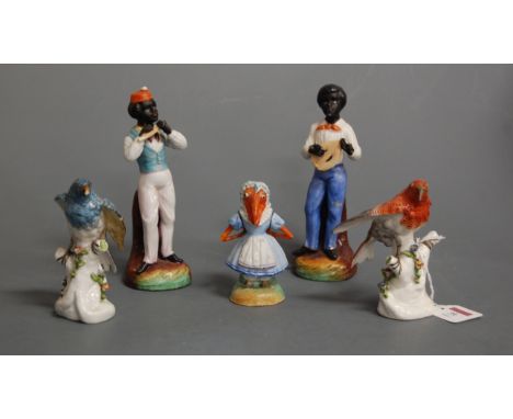 A pair of early 20th century German porcelain figures of birds, each perched on a floral encrusted branch having blue crossed