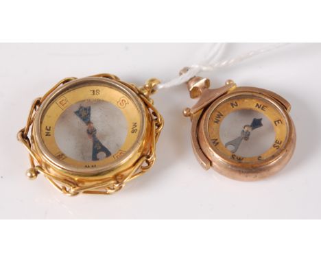 A 9ct gold mounted pendant compass; and one other similar, gross weight 14.7g (2)