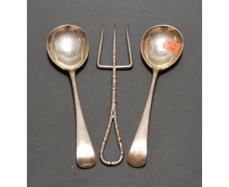A pair of 19th century Scottish white metal salad spoons; together with a silver toasting fork, gross weight 6.4oz (3)