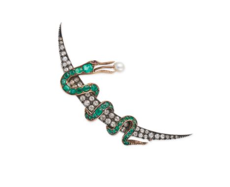 AN ANTIQUE EMERALD, DIAMOND, PEARL AND RUBY CRESCENT MOON AND SNAKE BROOCH in yellow gold and silver, designed as a snake ent