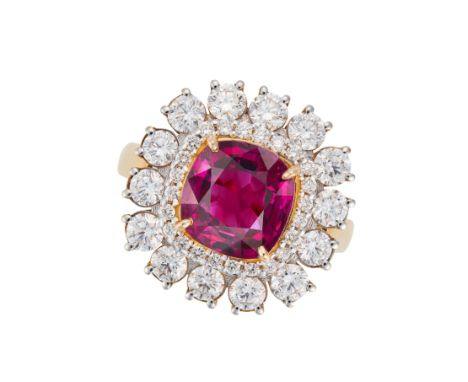 A 4.53 CARAT BURMA NO HEAT RUBY AND DIAMOND RING in 18ct yellow gold, set with a cushion cut ruby of 4.53 carats in a double 