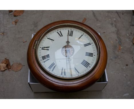An old mahogany postman's alarm clock,&nbsp;29cm diameter, with weight and pendulum.&nbsp; 
