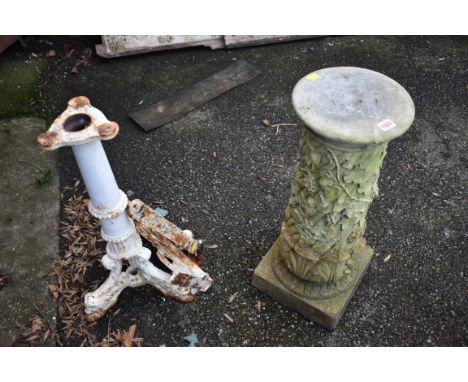 A reconstituted stone pillar; together with a cast iron table base and two brackets.Collection of this lot is strictly by app